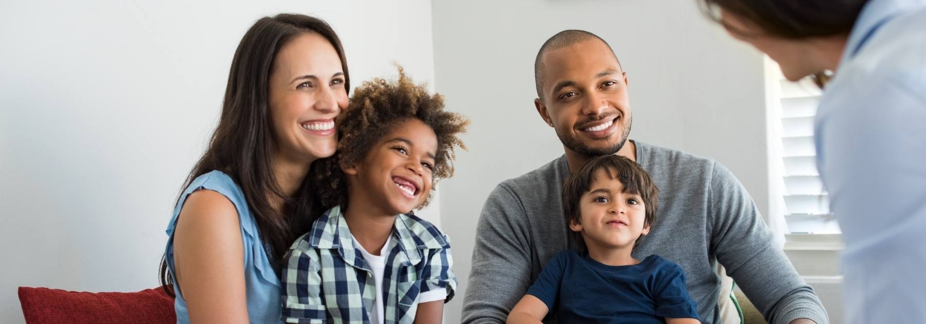 family talking to doctor vaccine 